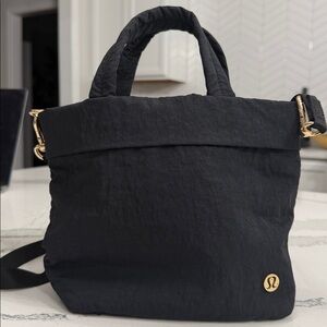 Lululemon Nylon Black Tote Crossbody Bag with gold accents.